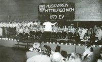 Jahreskonzert in der Schubarthalle Obersontheim, Musikstück zusammen mit dem Gesangverein Mittelfischach